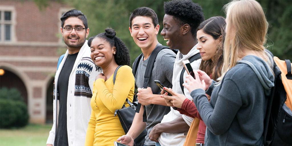 a group of college-age friends walking together