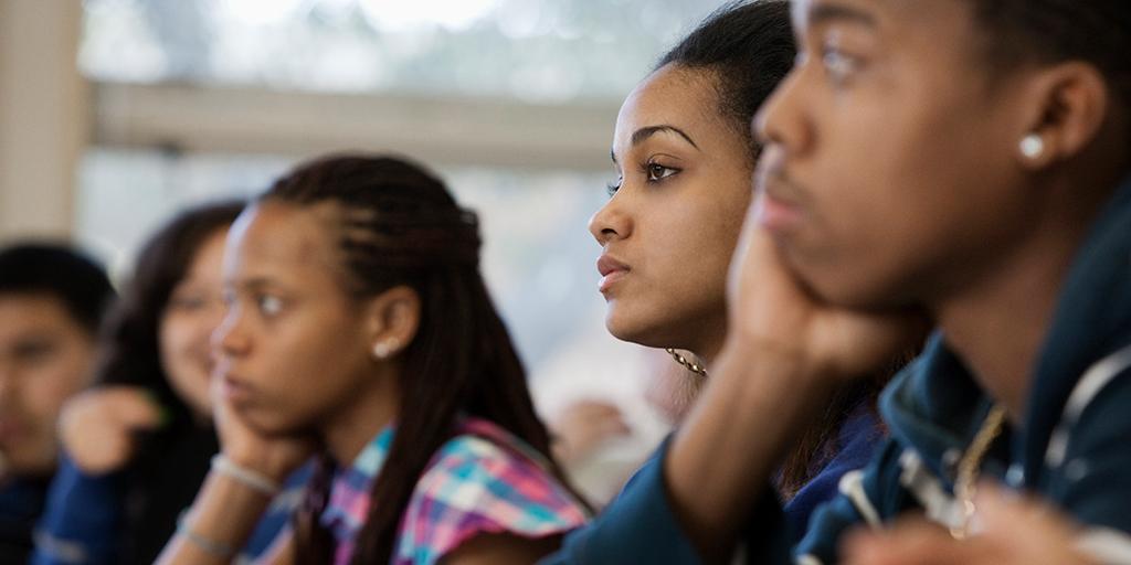 students listen in class