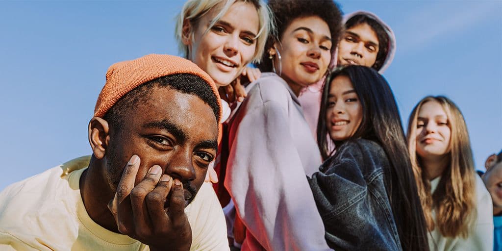 a group of young friends hang out together